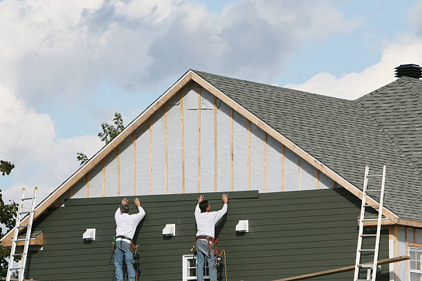 Professional Storm Damage Siding Repair technician working in Fulton, TX